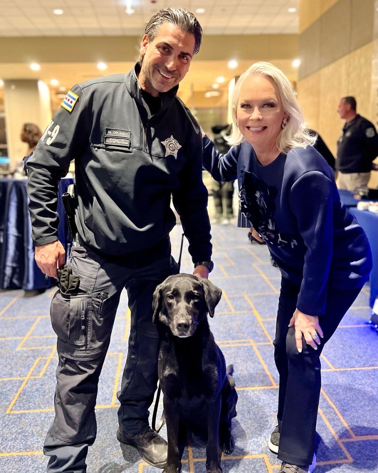 Candid Candace with Officer Orlando and his dog Rich at True Blue Event November 5.